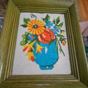 vintage framed piece of cross-stitch embroidery a bouquet of flowers in a vase